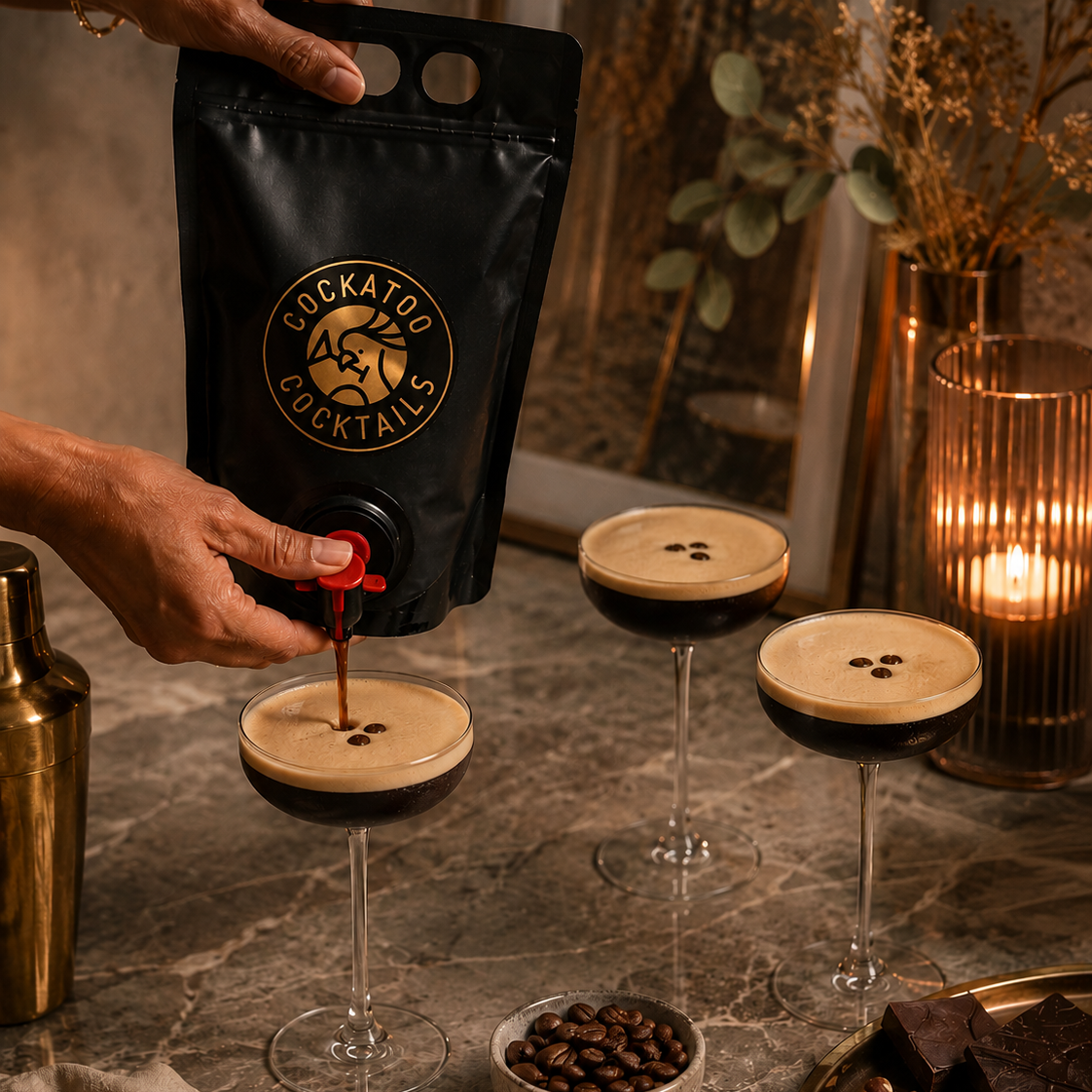 A person pours Espresso Martini Poch